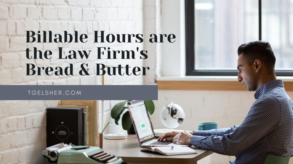 Attorney entering billable hours at computer